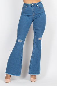 REACHING NEW HEIGHTS FLARED JEANS