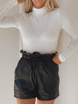 PICKY BUT PROMISING FAUX LEATHER SHORTS